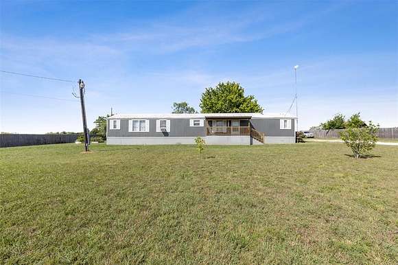3.07 Acres of Residential Land with Home for Sale in Grandview, Texas