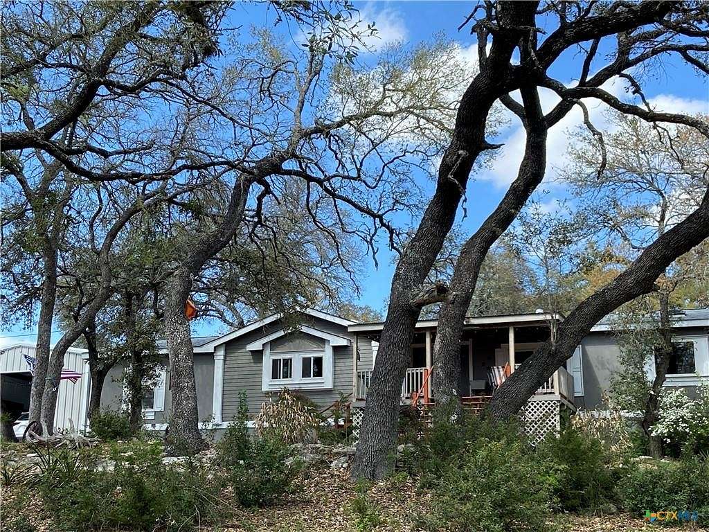6.44 Acres of Residential Land with Home for Sale in Canyon Lake, Texas