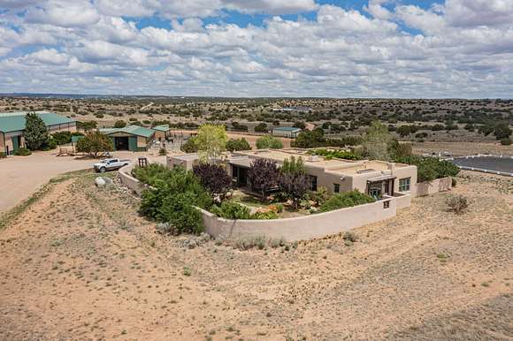 19.5 Acres of Land with Home for Sale in Lamy, New Mexico