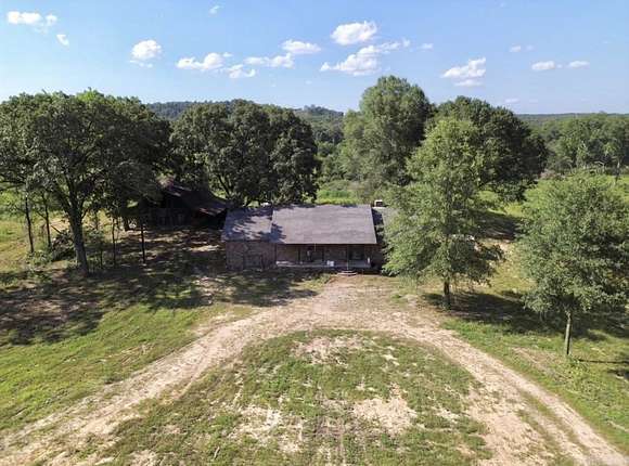 47 Acres of Land with Home for Sale in Plumerville, Arkansas