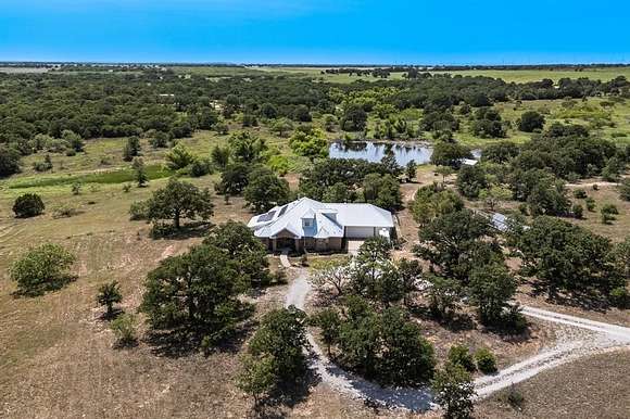 160 Acres of Agricultural Land with Home for Sale in Cisco, Texas