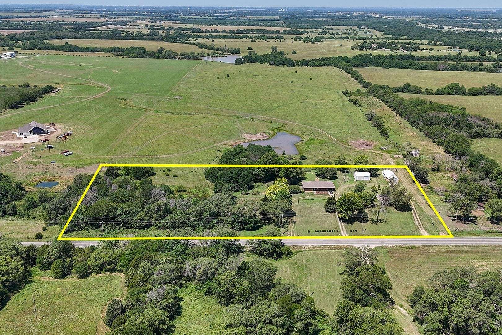 4.7 Acres of Residential Land with Home for Auction in Towanda, Kansas