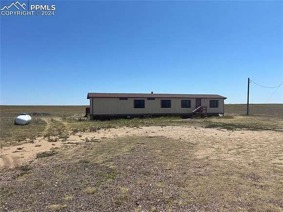 40 Acres of Agricultural Land with Home for Sale in Yoder, Colorado