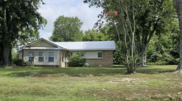 2.5 Acres of Residential Land with Home for Sale in Sharon, Tennessee