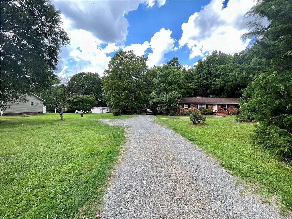 3.87 Acres of Residential Land with Home for Sale in Matthews, North Carolina