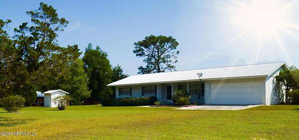 9 Acres of Residential Land with Home for Sale in Welaka, Florida