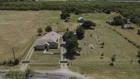 5.488 Acres of Residential Land with Home for Sale in Iowa Park, Texas