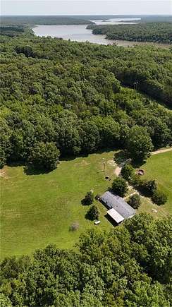 7.9 Acres of Residential Land with Home for Sale in Lowry City, Missouri