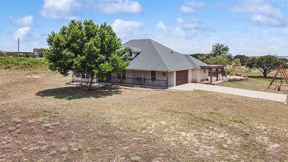 20 Acres of Agricultural Land with Home for Sale in Godley, Texas