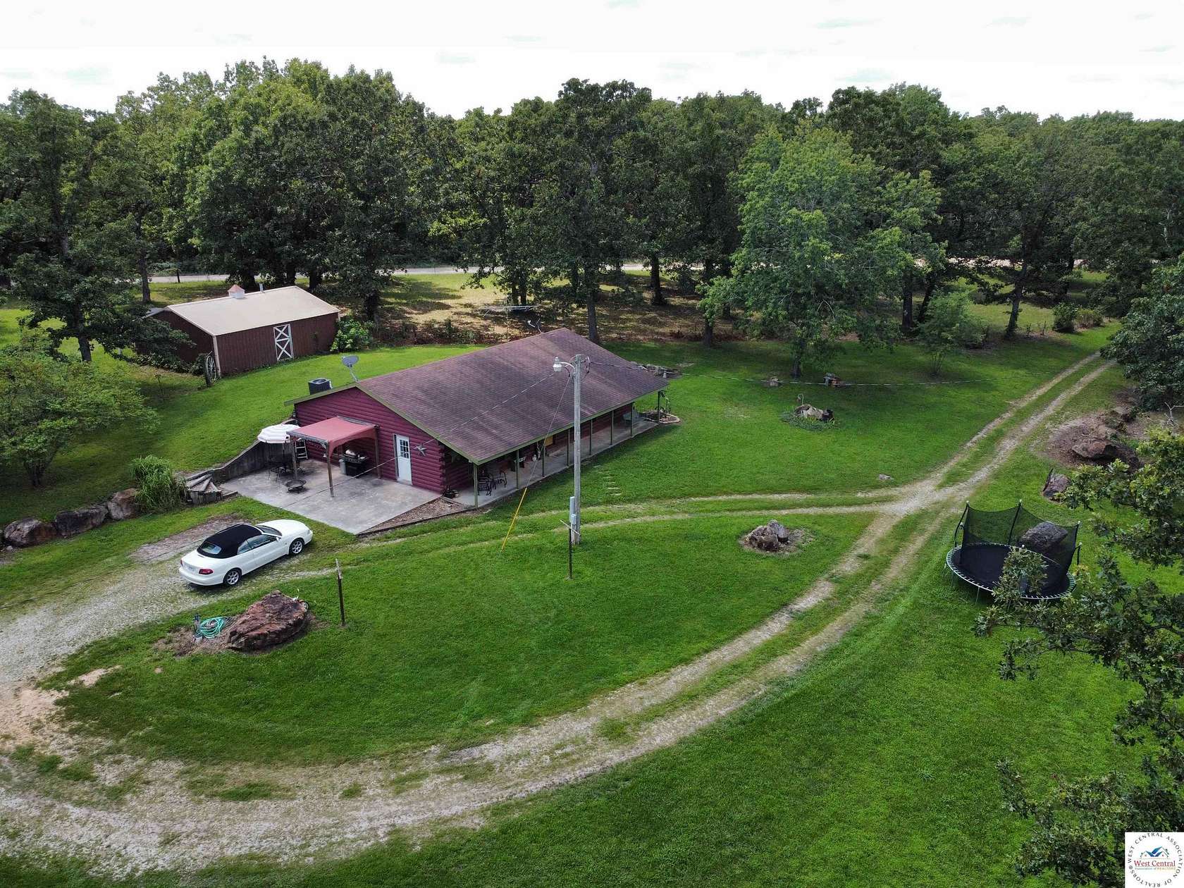2.3 Acres of Residential Land with Home for Sale in Cole Camp, Missouri