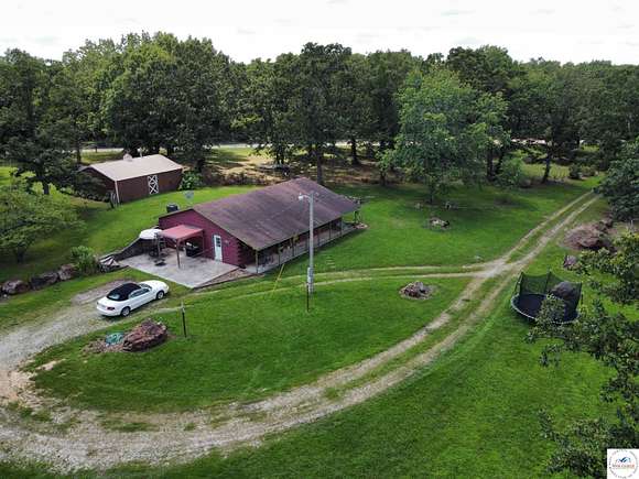 2.3 Acres of Residential Land with Home for Sale in Cole Camp, Missouri