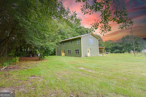 10.32 Acres of Land with Home for Sale in Meansville, Georgia