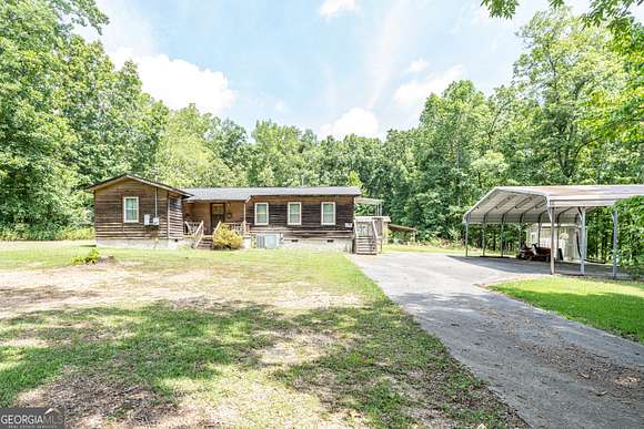 3.21 Acres of Residential Land with Home for Sale in Lindale, Georgia