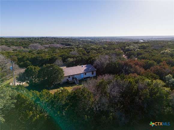 25.162 Acres of Recreational Land with Home for Sale in Kempner, Texas