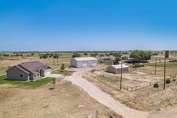 2.19 Acres of Residential Land with Home for Sale in Wiggins, Colorado