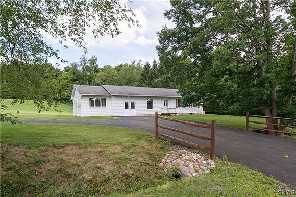 9.5 Acres of Land with Home for Sale in Locke, New York