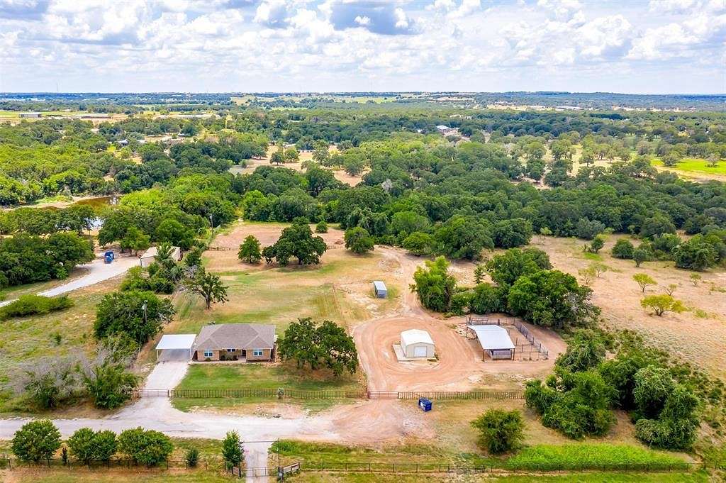 4.75 Acres of Residential Land with Home for Sale in Poolville, Texas