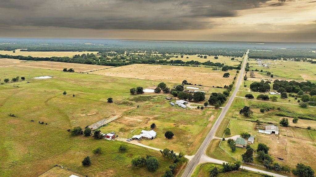 2.978 Acres of Residential Land with Home for Sale in Honey Grove, Texas