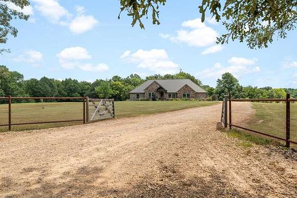 5.5 Acres of Residential Land with Home for Sale in Honey Grove, Texas