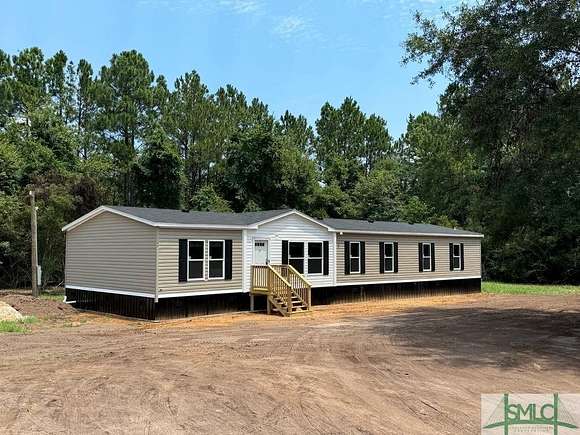 5.09 Acres of Residential Land with Home for Sale in Ludowici, Georgia