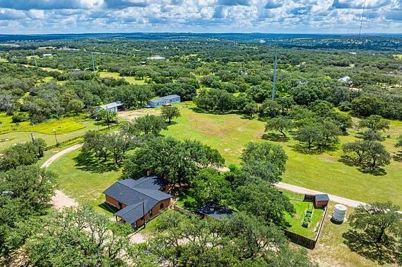 14.36 Acres of Land with Home for Sale in Johnson City, Texas