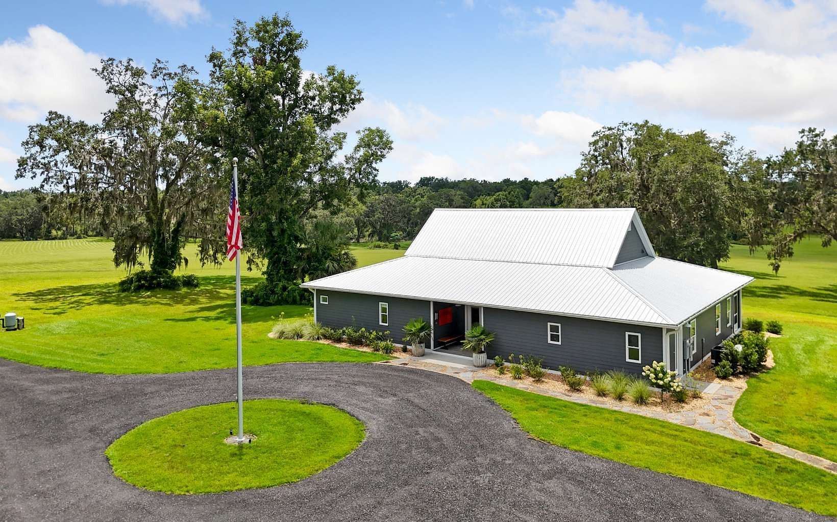 82.8 Acres of Agricultural Land with Home for Sale in Jennings, Florida