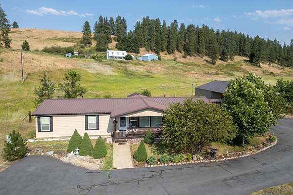 6.28 Acres of Residential Land with Home for Sale in Evans, Washington
