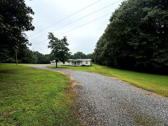 2.39 Acres of Residential Land with Home for Sale in South Fulton, Tennessee