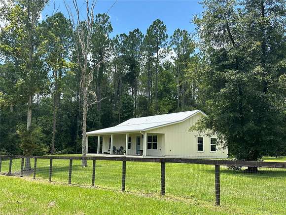 10.03 Acres of Land with Home for Sale in Reddick, Florida