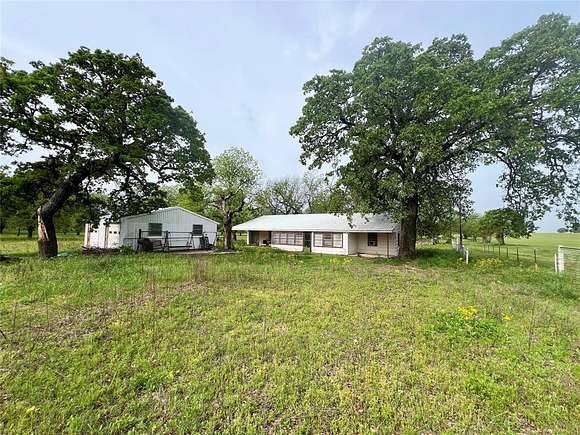 21 Acres of Land with Home for Sale in Newcastle, Texas