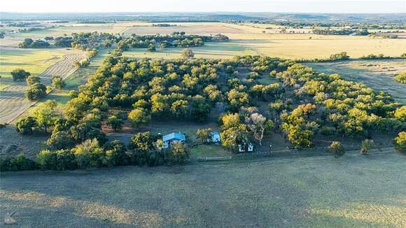 21 Acres of Land with Home for Sale in Newcastle, Texas