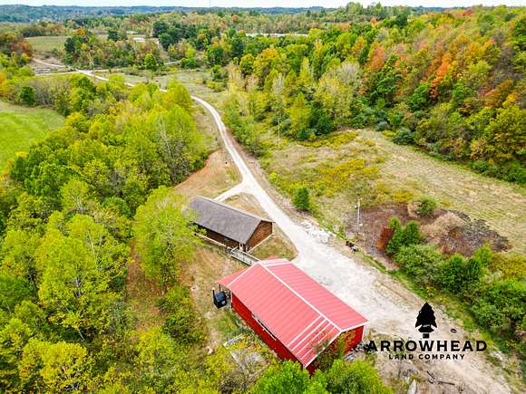 64 Acres of Land with Home for Sale in New Concord, Ohio