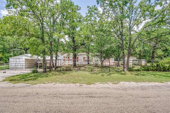 14.2 Acres of Land with Home for Sale in Weatherford, Texas