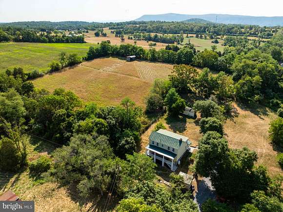 12.41 Acres of Land with Home for Sale in Toms Brook, Virginia