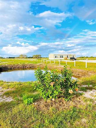 1.25 Acres of Residential Land with Home for Sale in Okeechobee, Florida