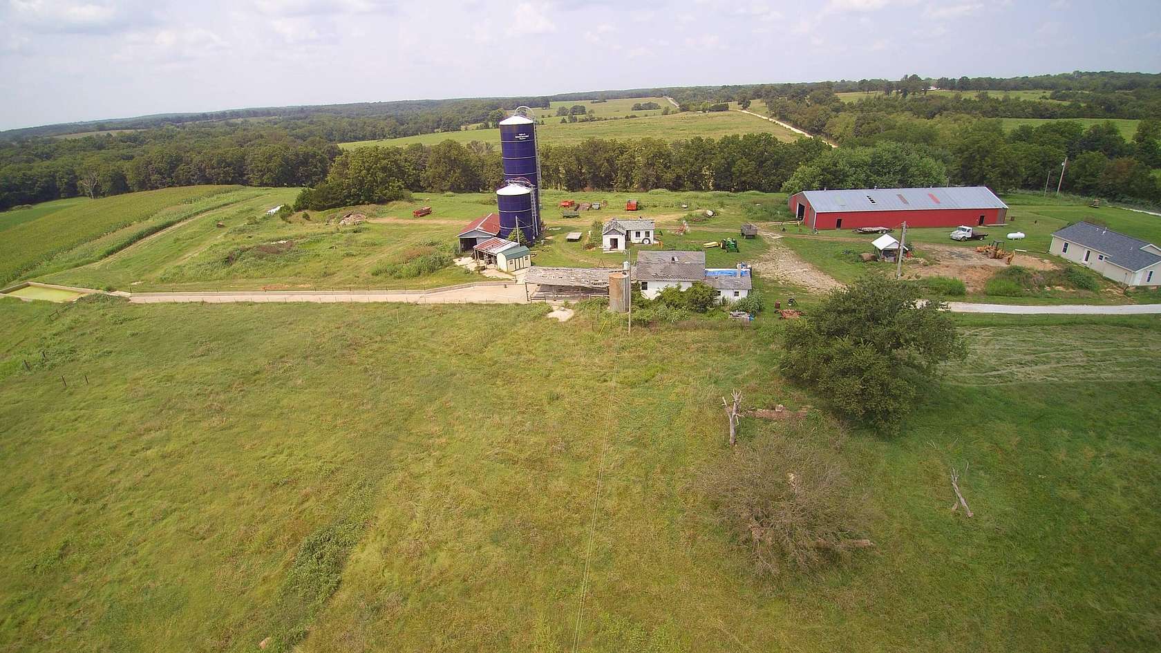 143 Acres of Agricultural Land with Home for Sale in Grovespring, Missouri