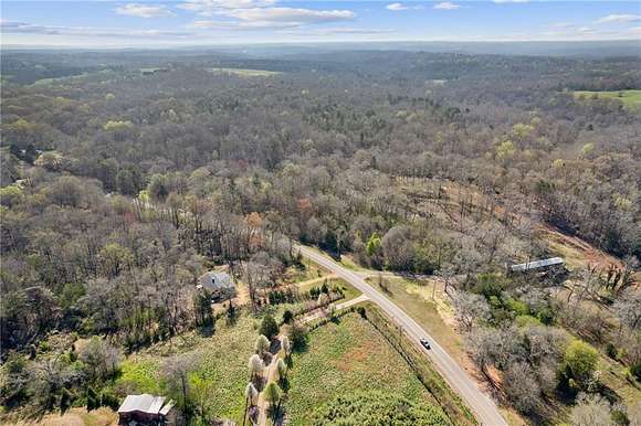 100.09 Acres of Agricultural Land with Home for Sale in Royston, Georgia