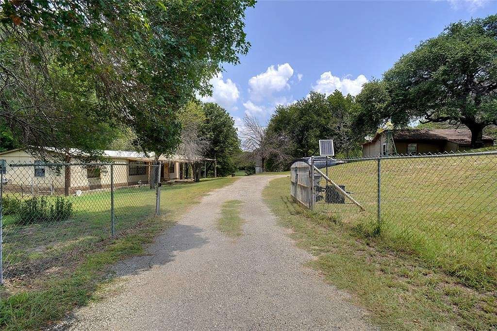 5.97 Acres of Residential Land with Home for Sale in Reno, Texas