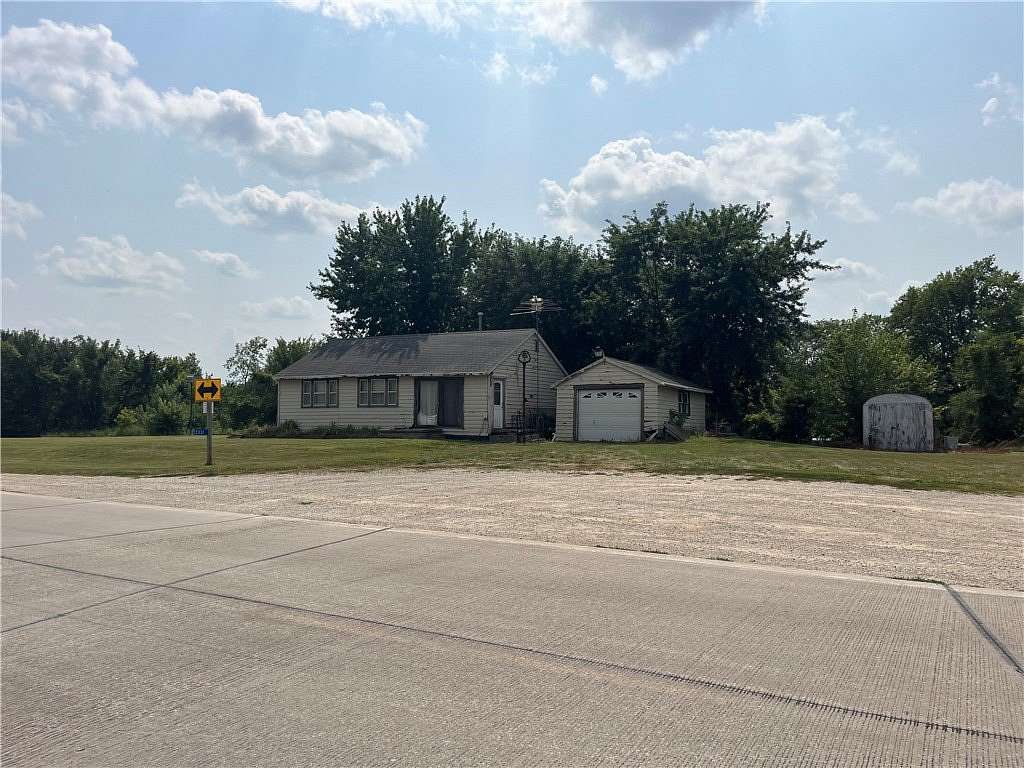 5.72 Acres of Residential Land with Home for Sale in Winterset, Iowa