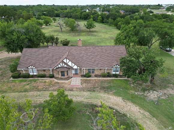 4 Acres of Residential Land with Home for Sale in Sachse, Texas