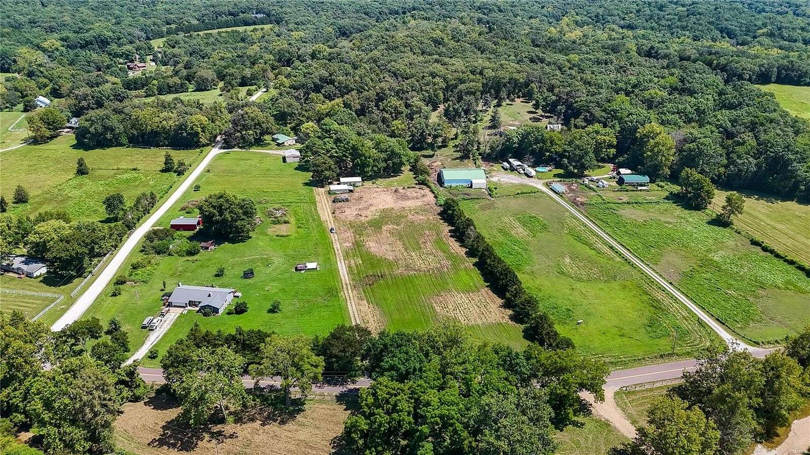 5.37 Acres of Residential Land with Home for Sale in Dittmer, Missouri