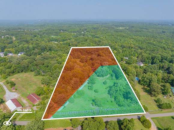 11.5 acre property. Approximately 8.66 acres with barn on left