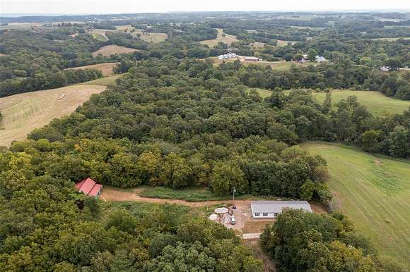 10.7 Acres of Land with Home for Sale in Perryville, Missouri