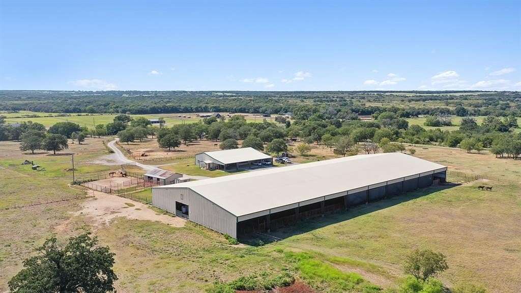 21.07 Acres of Agricultural Land with Home for Sale in Lipan, Texas