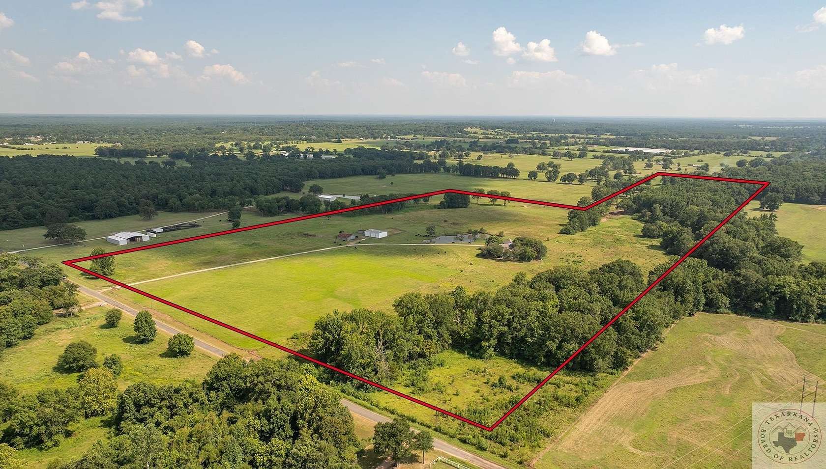 53.5 Acres of Agricultural Land with Home for Sale in New Boston, Texas