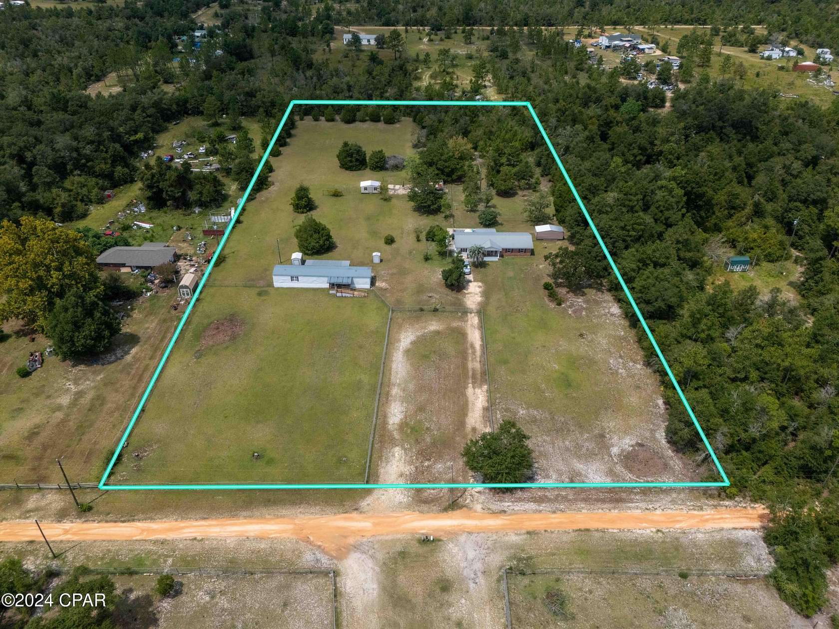 5 Acres of Residential Land with Home for Sale in Fountain, Florida