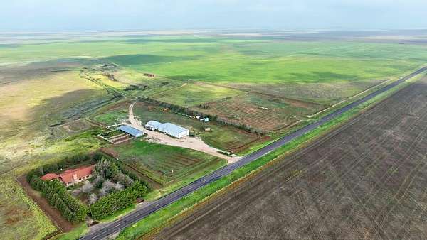 326 Acres of Land with Home for Sale in Gruver, Texas