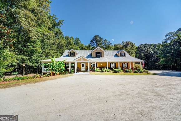 11.62 Acres of Land with Home for Sale in McDonough, Georgia