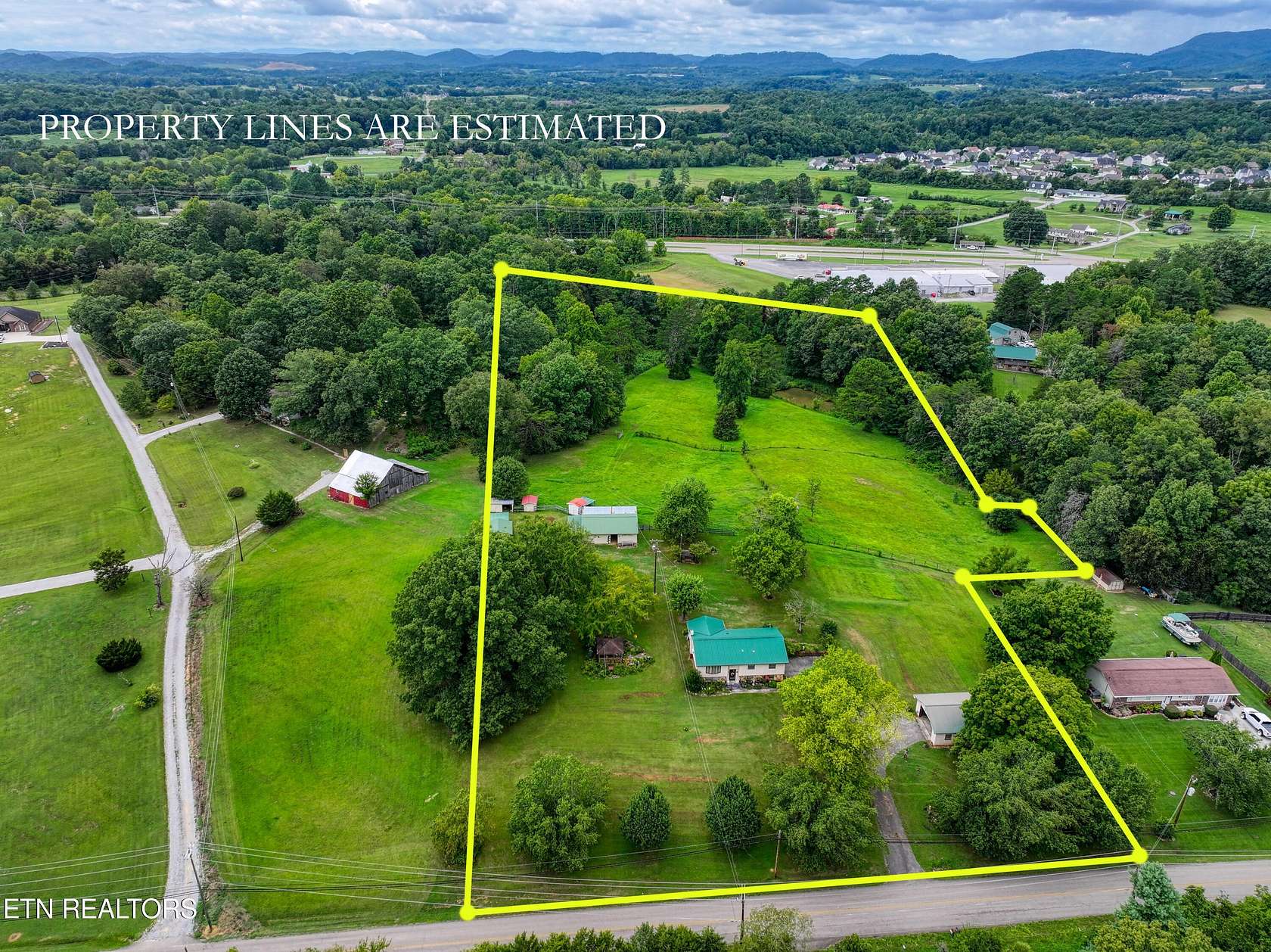 6.8 Acres of Land with Home for Sale in Strawberry Plains, Tennessee