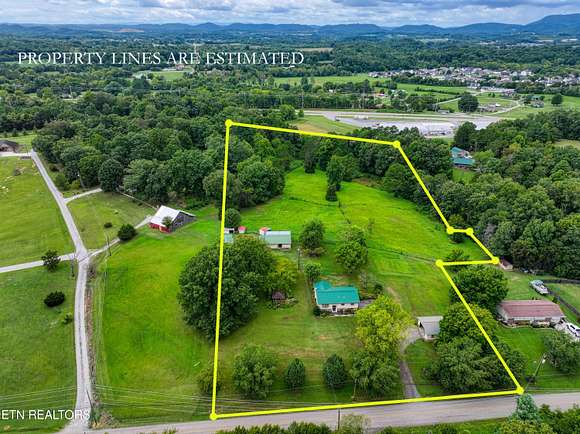 6.8 Acres of Land with Home for Sale in Strawberry Plains, Tennessee